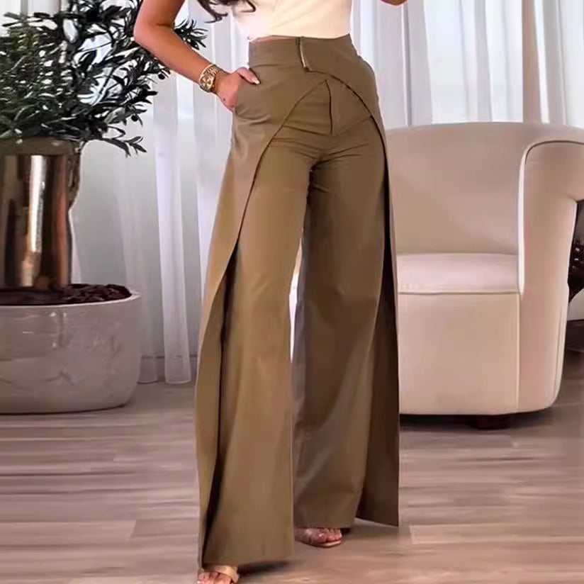 Woman wearing caramel high-waist wide-leg trousers with a white cropped top and heeled sandals.