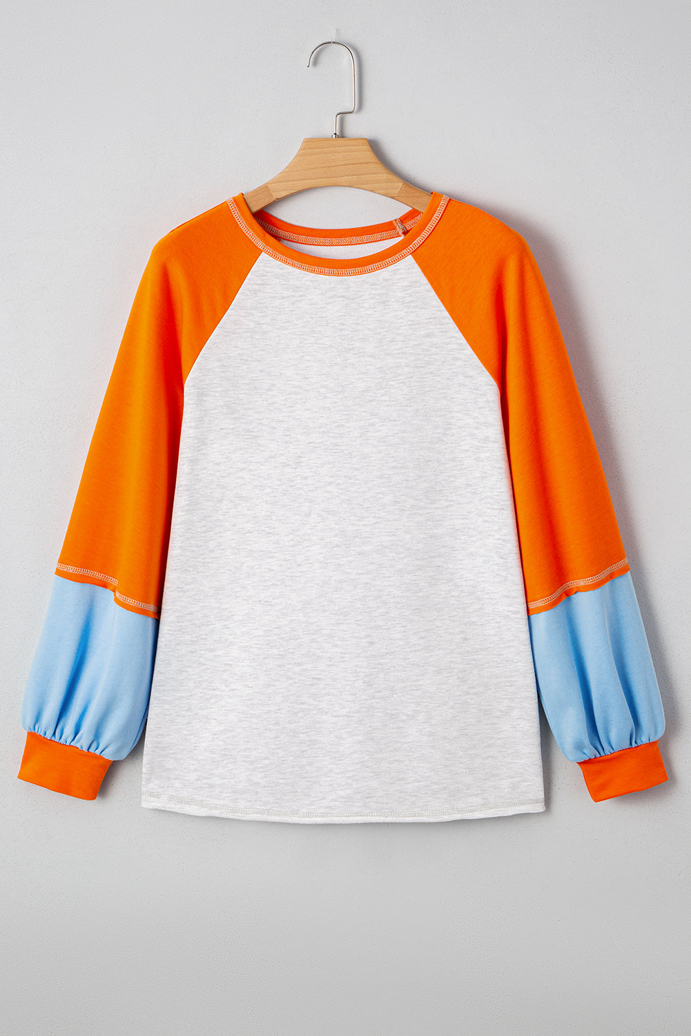 Blusa Elsie de manga raglan e modelagem solta